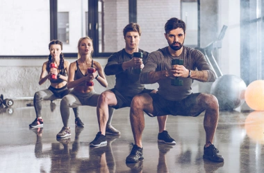 Chiropractic-East-Lansing-MI-Group-Of-Four-Adults-Exercising.webp